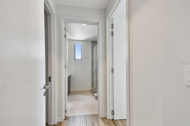 hall featuring light hardwood / wood-style floors