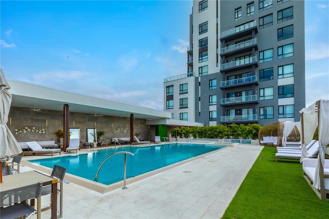 view of pool featuring a patio area