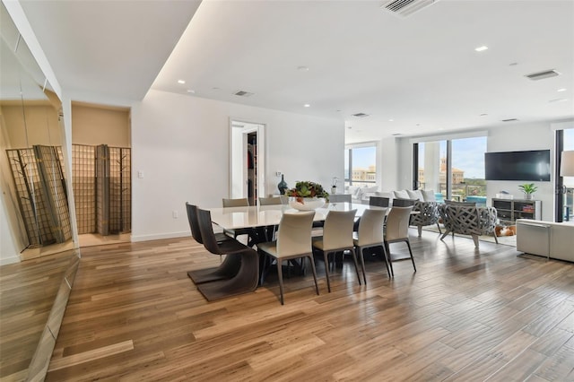 dining room with light hardwood / wood-style flooring