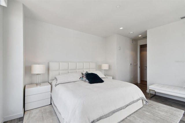 bedroom with light hardwood / wood-style flooring