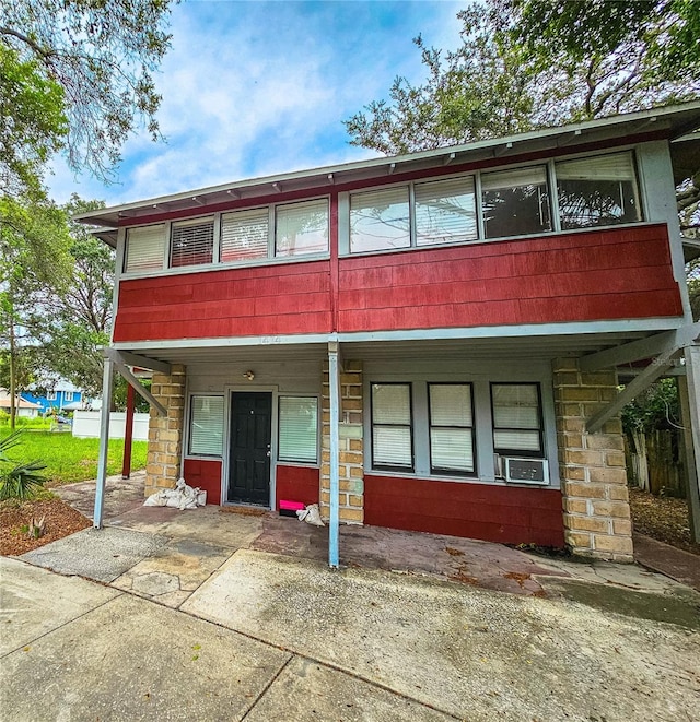 view of front of house with cooling unit