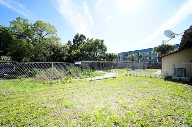 view of yard featuring central AC unit