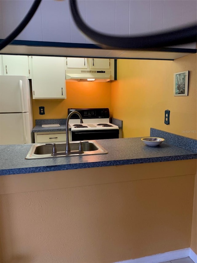 kitchen featuring sink and white appliances