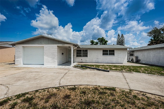 ranch-style home with a garage