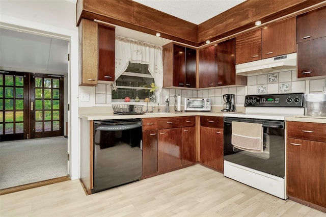 kitchen with black dishwasher, electric range, light hardwood / wood-style floors, and decorative backsplash