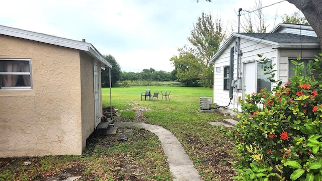 view of yard featuring cooling unit