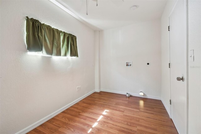 spare room featuring hardwood / wood-style flooring