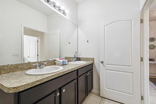 bathroom with vanity and tile patterned floors