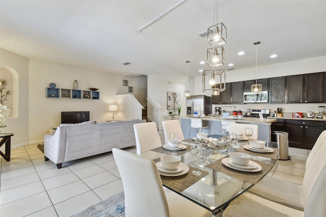 dining room featuring light tile patterned floors