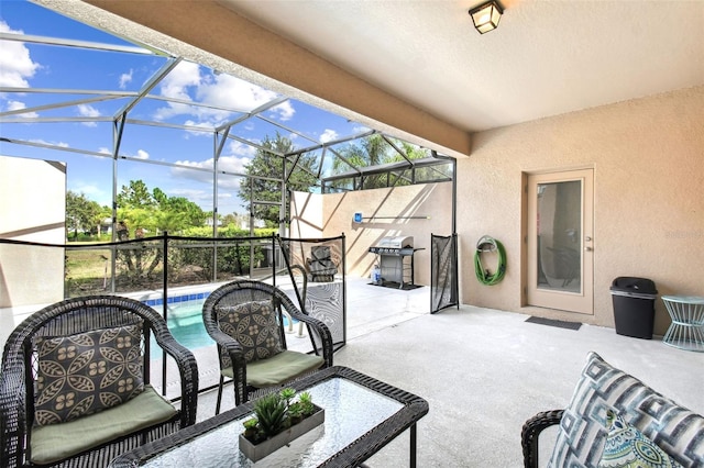 view of patio featuring glass enclosure