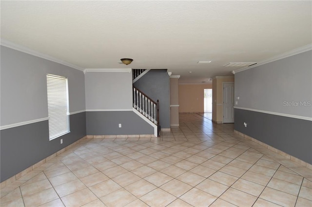 tiled empty room with ornamental molding