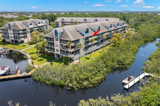 drone / aerial view featuring a water view