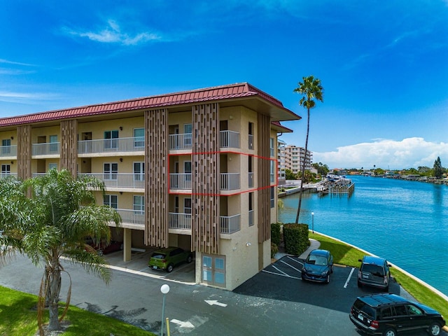 view of building exterior featuring a water view