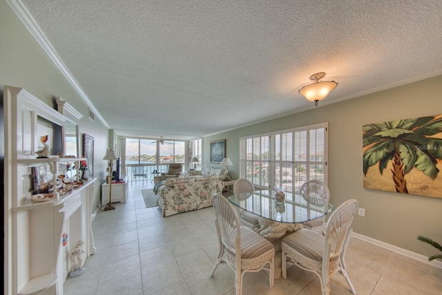 dining area featuring crown molding, a textured ceiling, and light tile patterned flooring