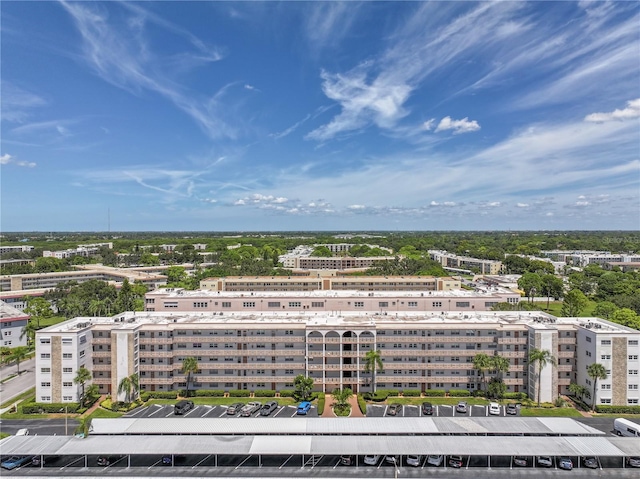 birds eye view of property with a city view