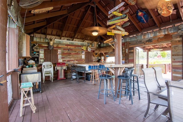 deck featuring a gazebo and a bar