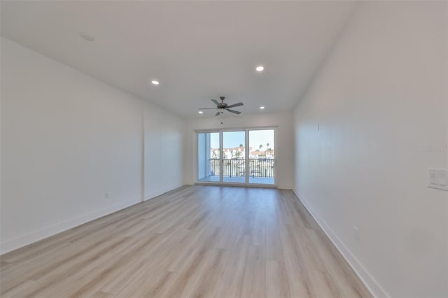 unfurnished room with recessed lighting, ceiling fan, light wood-style flooring, and baseboards