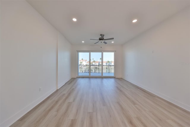 empty room featuring light wood-style flooring, baseboards, ceiling fan, and recessed lighting