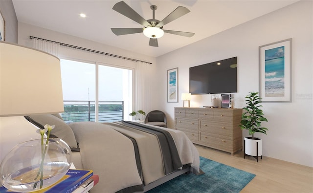 bedroom with ceiling fan and light wood-style flooring