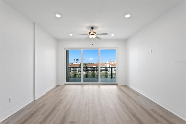 unfurnished room with a ceiling fan, light wood-style floors, and recessed lighting