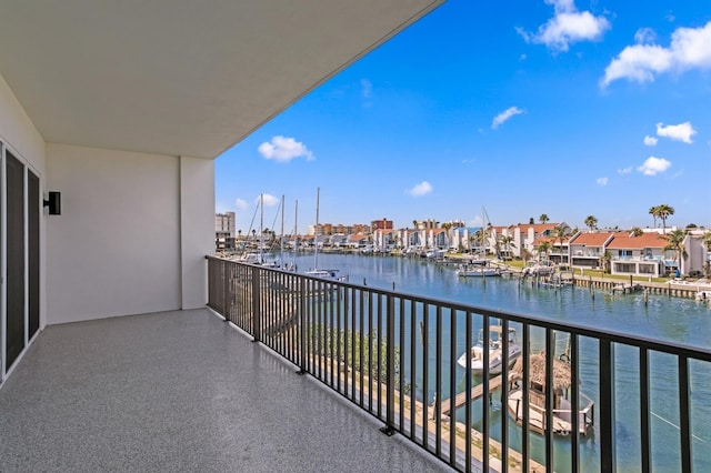 balcony featuring a water view