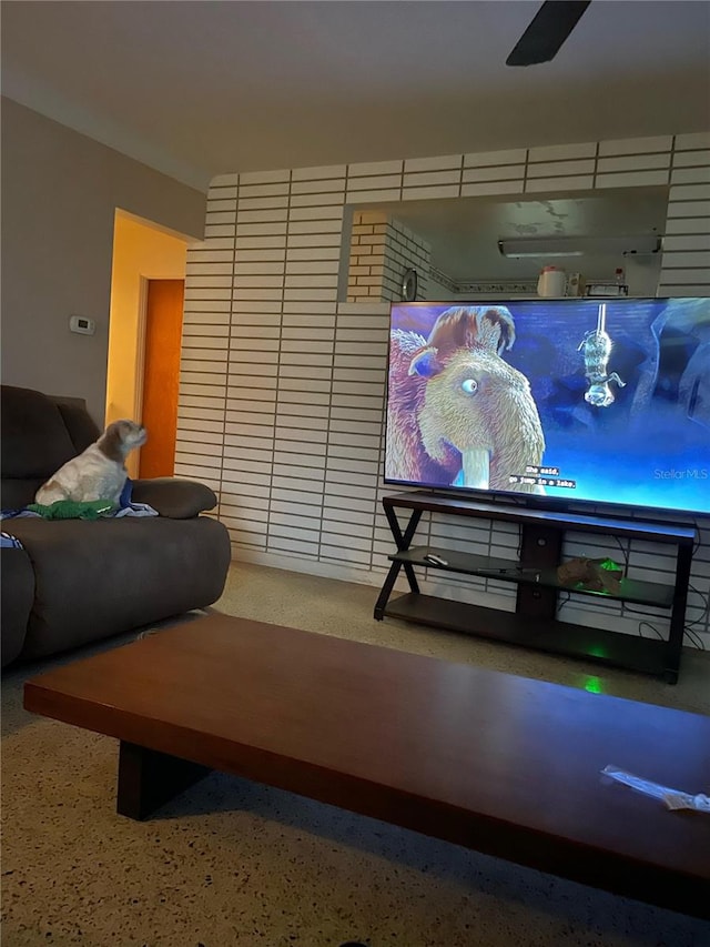 living room featuring ceiling fan