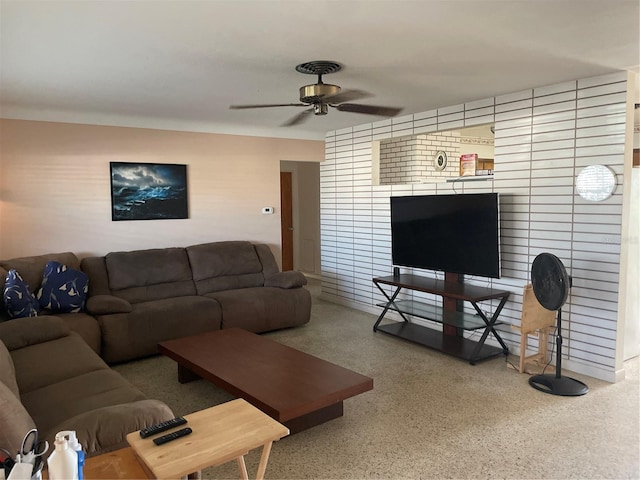 living room with ceiling fan