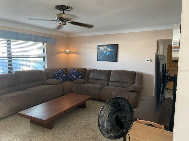 living room featuring ceiling fan