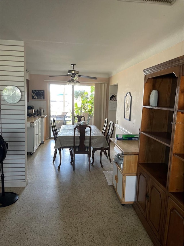 dining area with ceiling fan