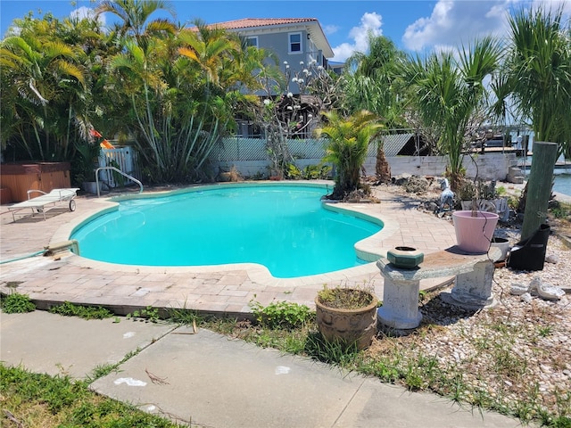 view of pool featuring a patio