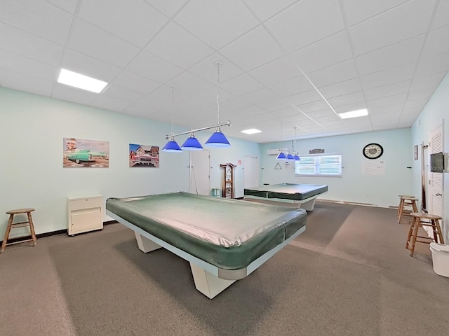 game room featuring pool table, dark colored carpet, and a drop ceiling