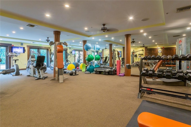 exercise room featuring ceiling fan and carpet floors