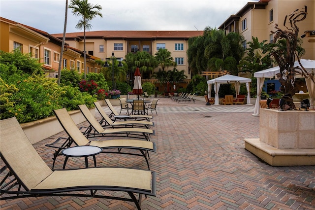 view of property's community featuring a gazebo and a patio