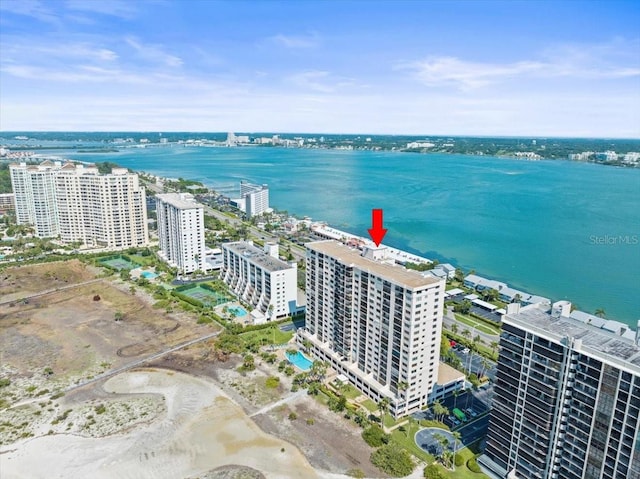 birds eye view of property with a water view