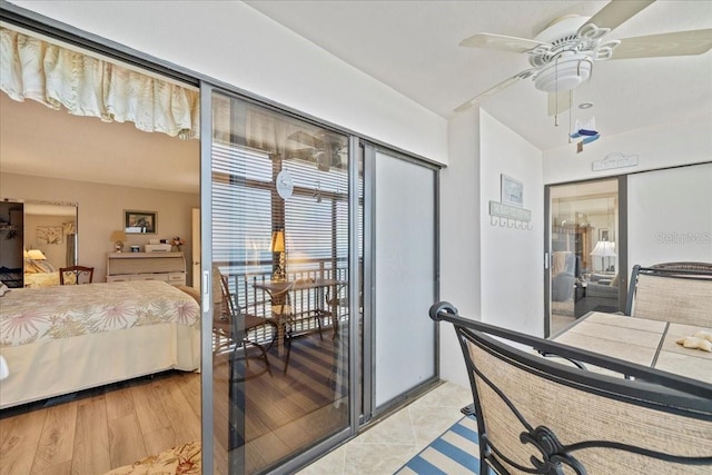 bedroom featuring light hardwood / wood-style flooring and ceiling fan