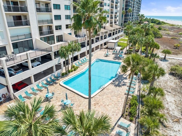 view of pool with a water view