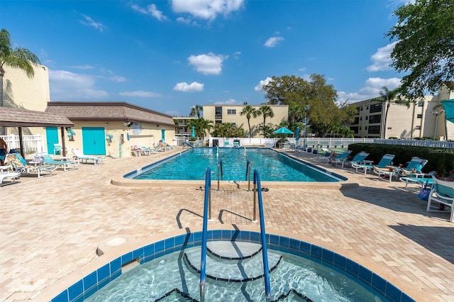 view of pool featuring a patio area