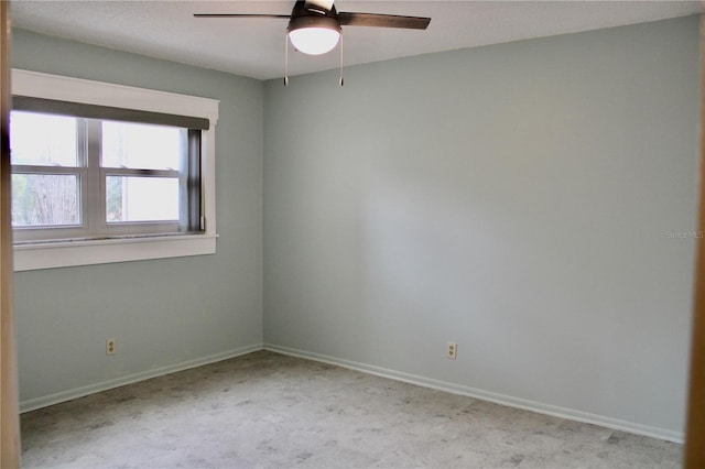 spare room featuring ceiling fan