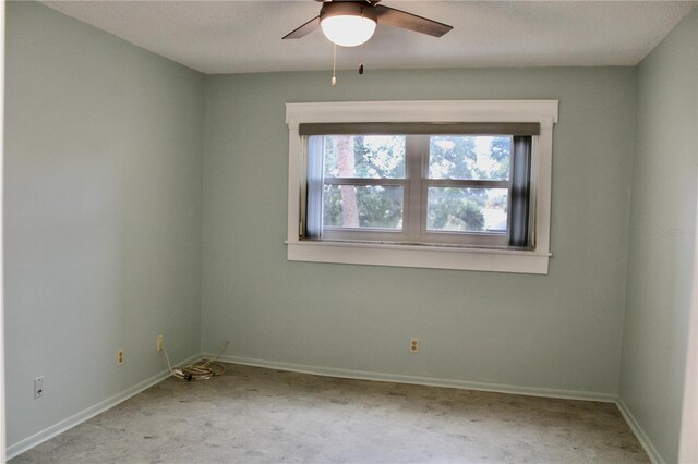 spare room featuring ceiling fan