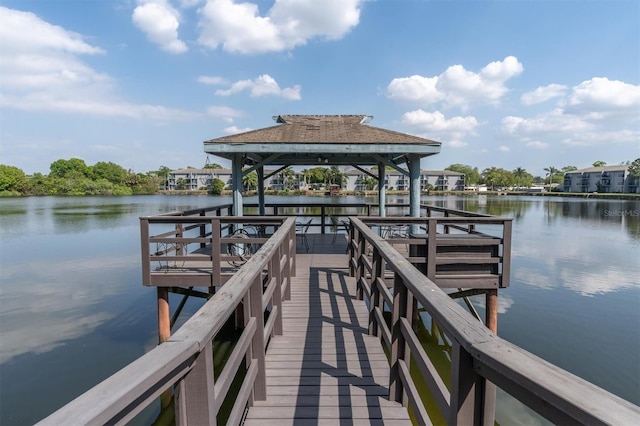 dock area featuring a water view and a gazebo