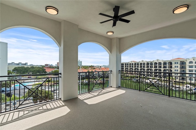 balcony featuring ceiling fan