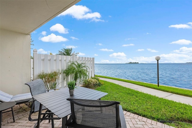 view of patio / terrace featuring a water view