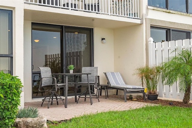 view of patio / terrace with a balcony