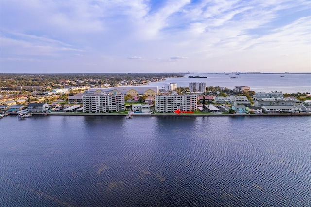 birds eye view of property featuring a water view