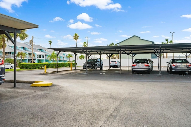 view of parking with a carport