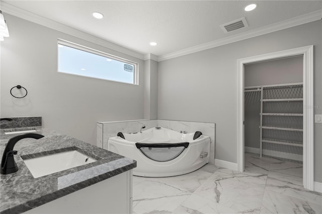 bathroom with dual vanity, a washtub, tile floors, and ornamental molding