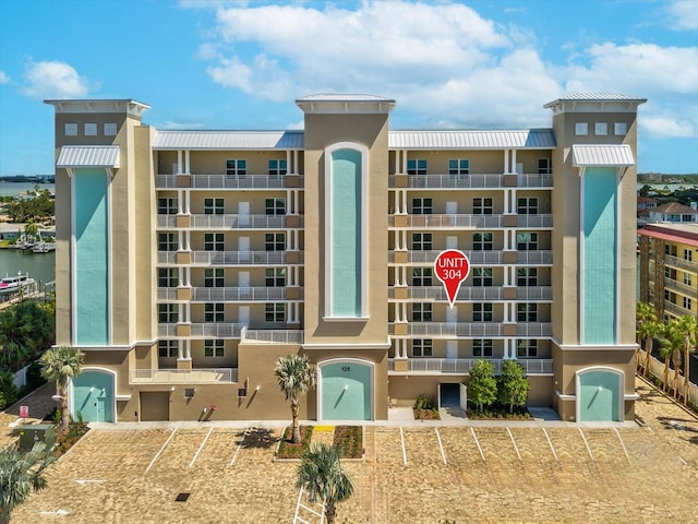 view of building exterior with a water view