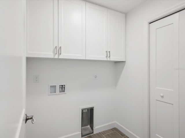 laundry area with washer hookup, cabinets, and hookup for an electric dryer