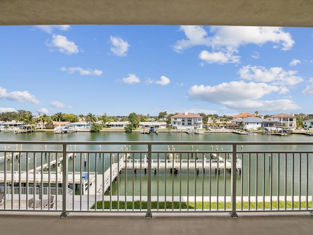 balcony featuring a water view