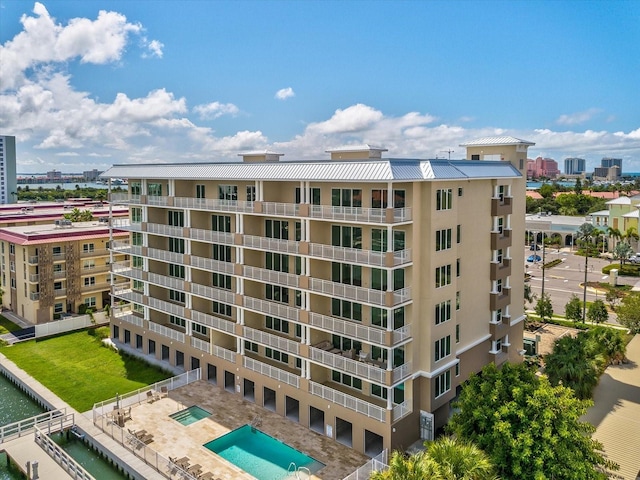 view of property with a community pool